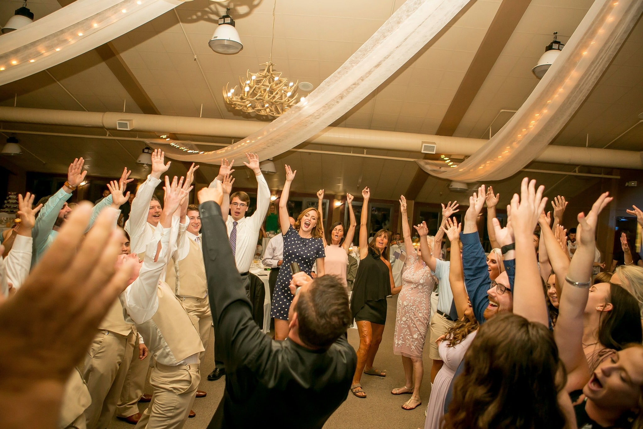 Crowd celebrating at a Pioneer Valley DJs private event in western Massachusetts